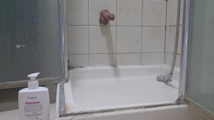 Pushing a dildo and playing games in the shower