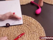 A lesbian couple playing a strip game and playing with small sex toys on each other 7/16