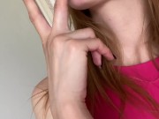 Pretty girl licking her fingers. 14/16