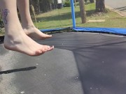Slow motion jumping on a trampoline in shorts & T-shirt regular woman jumping not a big tit slut 5/16