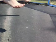 Slow motion jumping on a trampoline in shorts & T-shirt regular woman jumping not a big tit slut 7/16