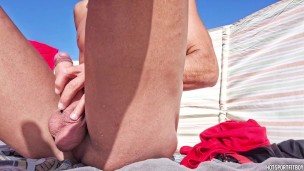 Massive hard cock on Full display at public beach - Watch as strangers can't resist sneaking glance
