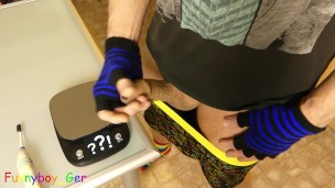 Horny emo jerks off his thick cock with an electric toothbrush and squirts his sperm onto scale