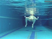 Cute petite teen wearing cute clothes underwater 10/16