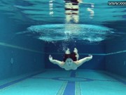 Cute petite teen wearing cute clothes underwater 12/16