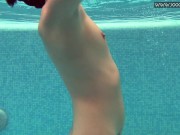 Cute petite teen wearing cute clothes underwater 15/16