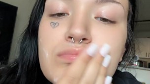 White girl smearing cum on face