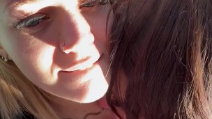 Close up POV of real lesbian couple kissing