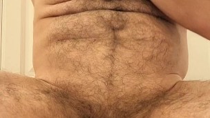 Hairy muscle bear shows off armpits and plays with nipples