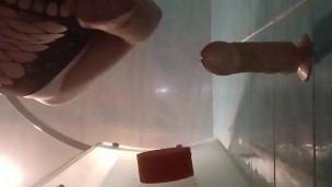 Tranny riding dildo in shower