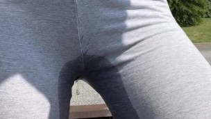 she couldn’t hold it and pees through her leggings in public