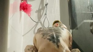 slim tattooed femboy naughty anal play shower