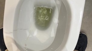 hot pissing at a public bathroom