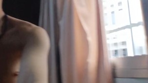 Open the window in the room and get naked