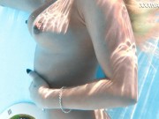 Hot milf pornstar Lisi swimming naked in the pool 14/16