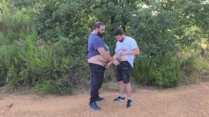 Two hairy bears fuck a cruising hunk