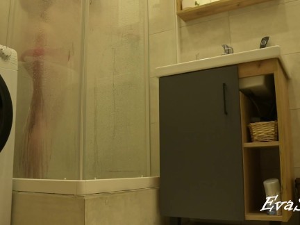 Stepmom takes a shower and cums