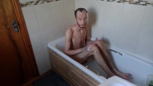 Super skinny male shows off his body while showering