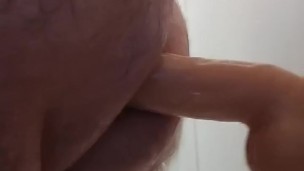 Chub fucked by big dildo in the shower
