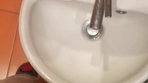 POV desperation pee into a sink AGAIN