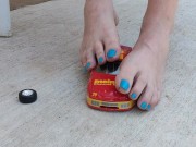 Destroying a model racecar toy with my barefeet smashing it into pieces 9/16
