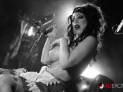 Busty brunette teases in this retro style video 9/16