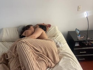 Lesbian sex under the covers on a cold morning
