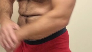 Hairy muscle bear flexing in red boxer briefs!