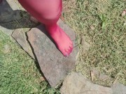 Walking around barefoot wearing red nylon stockings 9/16