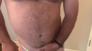Daddy Bear shows off in a tiny g-string