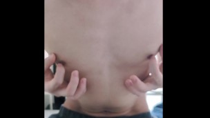 A perverted masochistic man's nipple masturbation, flicking the tip of his nipple with his fingers