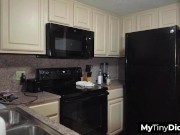 Busty brunette giving him a handjob in return for his repair services 1/16