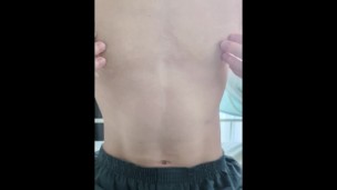 Masturbation using lotion to erotically stroke the nipples