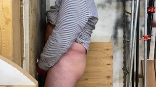 Two hairy Dads use a workshop gloryhole