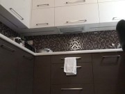 Sexy and Horny Braless Brunette Petite Girlfriend in the Kitchen in a Very Tight Dress to flash pussy and ass 15/16