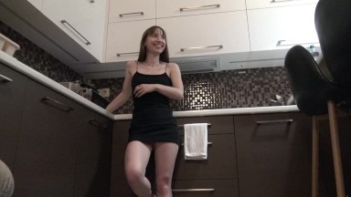 Sexy and Horny Braless Brunette Petite Girlfriend in the Kitchen in a Very Tight Dress to flash pussy and ass