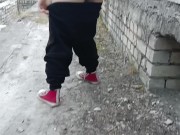 Golden rain on the street at an abandoned construction site undressing 1/16