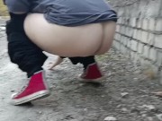 Golden rain on the street at an abandoned construction site undressing 2/16