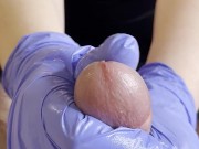 Hot Nurse rubs his cock until he cums on her gloved hands 13/16