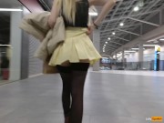 A girl walks in a short skirt without panties in a shopping mall 12/16