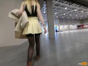 A girl walks in a short skirt without panties in a shopping mall 13/16