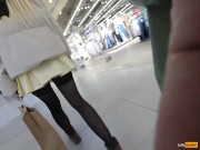 A girl walks in a short skirt without panties in a shopping mall 3/16