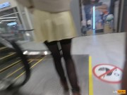 A girl walks in a short skirt without panties in a shopping mall 7/16