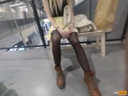 A girl walks in a short skirt without panties in a shopping mall 8/16