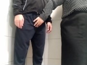 Gorgeous MILF jerks me off in a public toilet 1/16