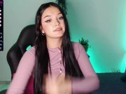 Cute college girl with a cute face shows her legs and feet in very cute pink stockings 3/16