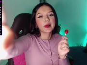 Cute college girl with a cute face looks very sexy while sucking a lollipop 13/16