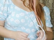 a redheaded hottie in an arousing blue dress. 13/16