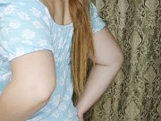 a redheaded hottie in an arousing blue dress. 8/16