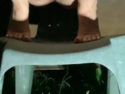 Girl lifts up dress to piss on chair 16/16